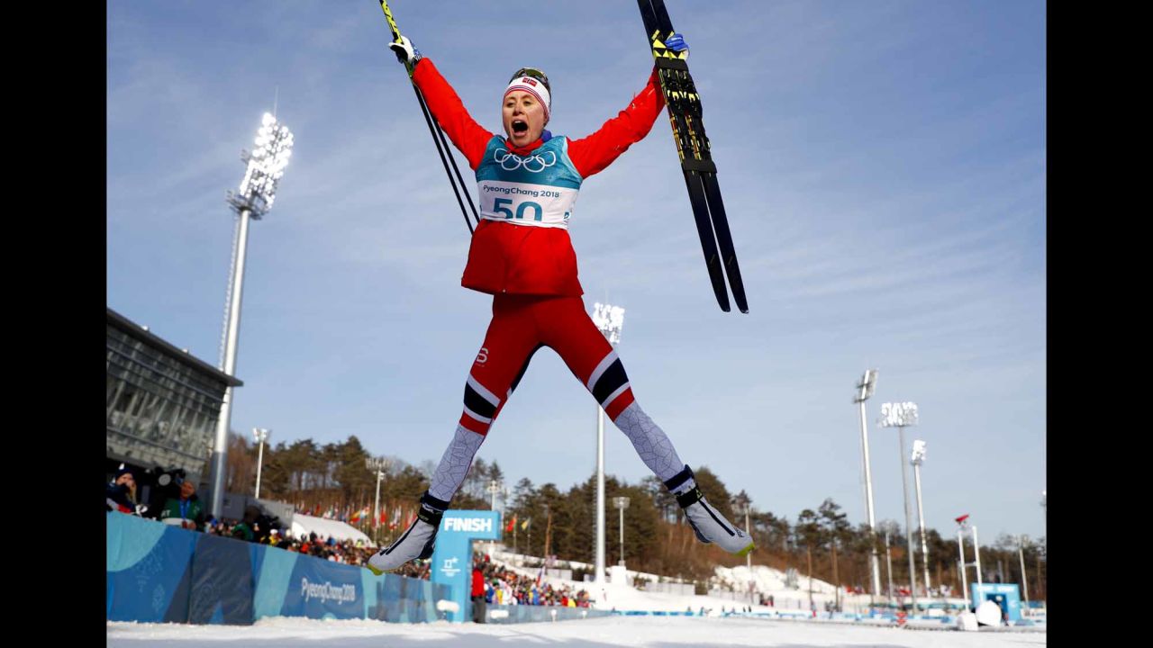 Norwegian cross-country skier Ragnhild Haga celebrates after winning gold in the 10-kilometer freestyle.