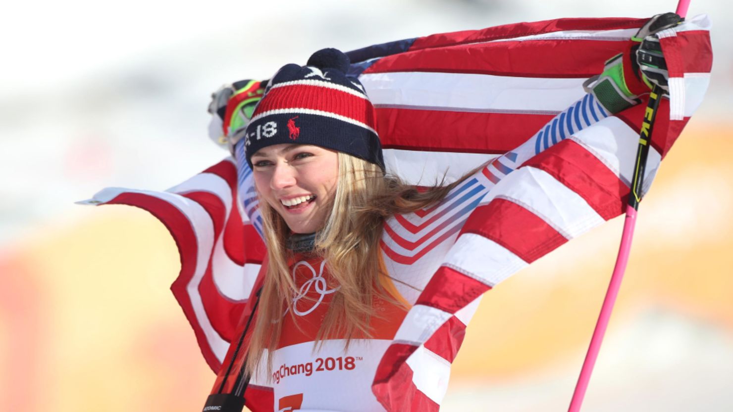Mikaela Shiffrin celebrates with the American flag after winning gold in the giant slalom on Thursday. (Tim Clayton/Corbis/Getty Images)