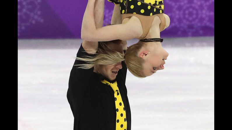 Evgenia Tarasova and Vladimir Morozov, figure skaters from Russia, perform during the pairs competition.