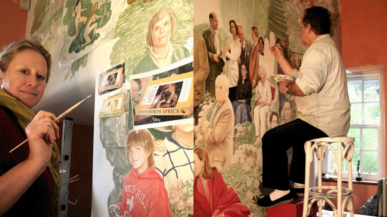 Elena Gubanova and Ivan Govorkov add portraits to the Fingask Castle subscription mural. 