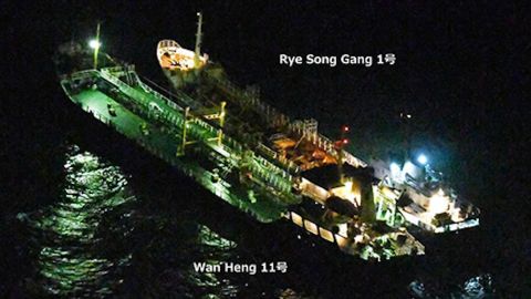 This image released by Japanese authorities shows the Rye Song Gang 1, a North Korean vessel, beside a Belizean-flagged ship. The Japanese government "strongly suspects" an illicit ship-to-ship transfer took place