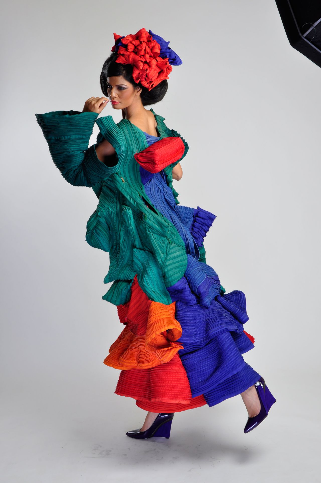 Sundaram has never been content to stick to a signature style. This image shows a work titled "Zip Around."