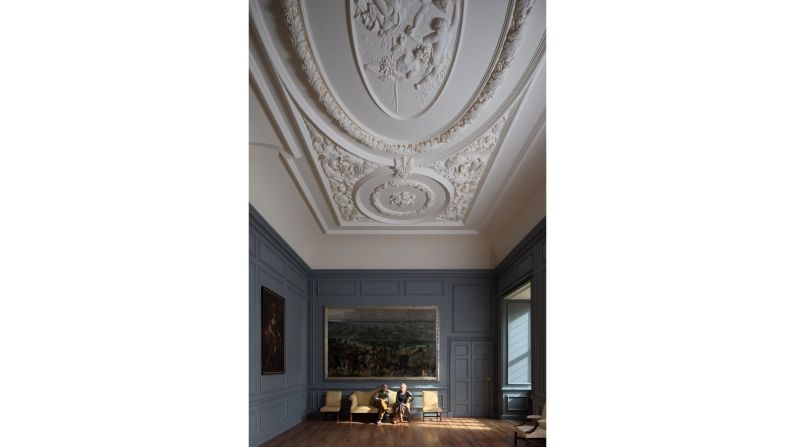 Francis and his wife Kishanda in the newly restored ballroom. "It's the biggest baroque plaster ceiling created this century, and it gives me real pleasure. I feel enormous pride in this fantastic room," says Fulford.