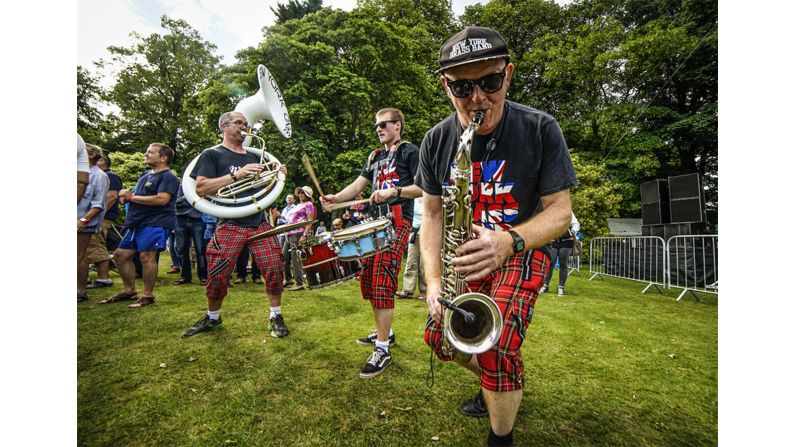 The New York Brass Band (from York, North Yorkshire) having musical fun at the Burton Agnes Jazz & Blues Festival. 