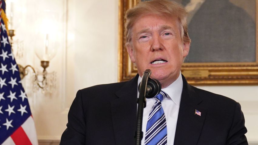 US President Donald Trump speaks on the Florida school shooting, in the Diplomatic Reception Room of the White House on February 15, 2018 in Washington, DC.
Earlier Thursday, President Trump issued a largely symbolic proclamation, ordering that flags be flown at half staff at US embassies, government buildings and military installations."Our nation grieves with those who have lost loved ones in the shooting at the Marjory Stoneman Douglas High School in Parkland, Florida," he said.
 / AFP PHOTO / Mandel NGAN        (Photo credit should read MANDEL NGAN/AFP/Getty Images)