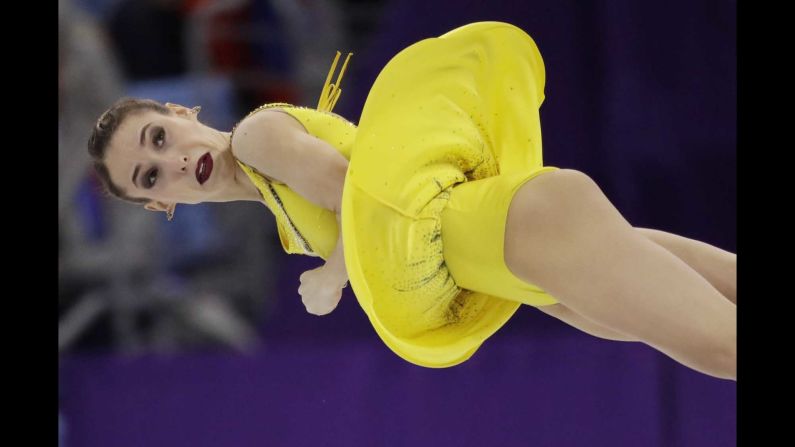 Kristina Astakhova, a figure skater from Russia, goes airborne as she and partner Alexei Rogonov compete in the pairs event.