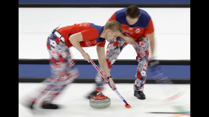 Norway's curling team competes against Canada.