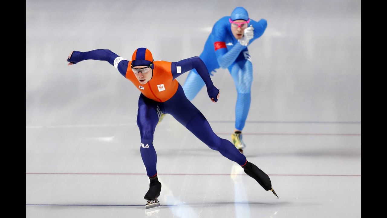 Dutch speedskater Jorrit Bergsma leads Italy's Davide Ghiotto in the 10,000 meters. Bergsma set a new Olympic record, but that was later broken by Canada's Ted-Jan Bloemen and he had to settle for the silver.