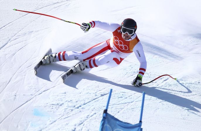 Austria's Matthias Mayer won gold in the super-G just a few days after a spectacular crash in the combined event. It's the second Olympic gold for Mayer, who won the downhill in 2014.