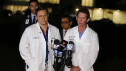 Dr. Igor Nichiporenko, Medical Director Trauma, left, and Dr. Evan Boyer, Medical Director, Emergency Services, speak about treating victims and the suspect at a press conference outside Broward Health North hospital, Wednesday, Feb. 14, 2018, in Deerfield Beach, Fla. A gunman opened fire at a nearby high school in Parkland, Fla. (AP Photo/Joe Skipper)