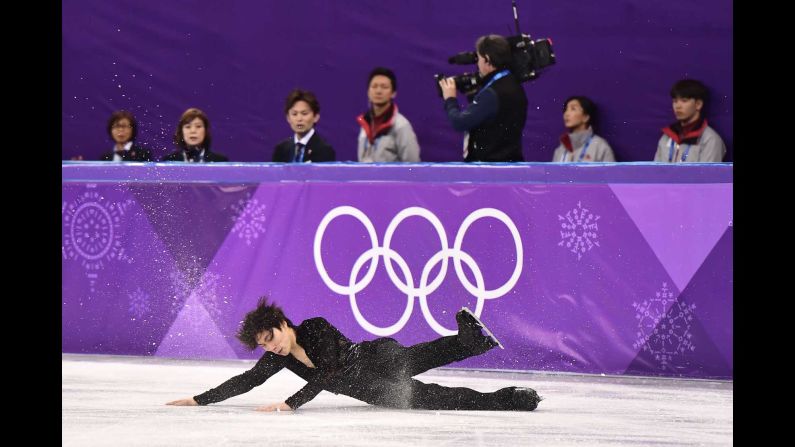 Japan's Keiji Tanaka falls during his short program.