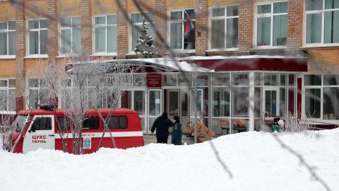 An emergency services vehicle is seen outside a secondary school in the city of Perm where a knife attack occurred on January 15.
