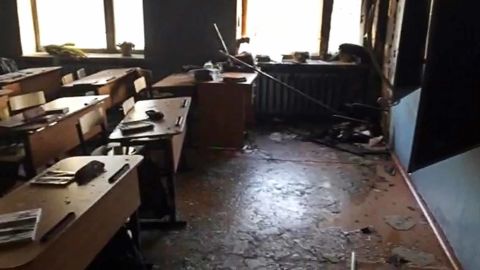 A video screen grab shows a classroom in Sosnovy Bor where a boy attacked his teacher and schoolmates with an ax and tried to start a fire before his arrest on January 19.