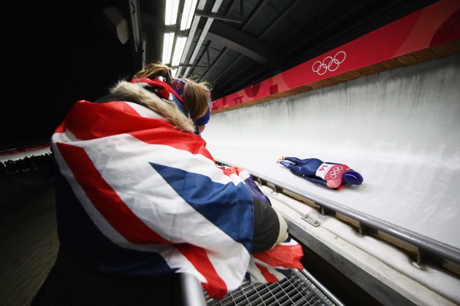 A fan watches British skeleton athlete Lizzy Yarnold.