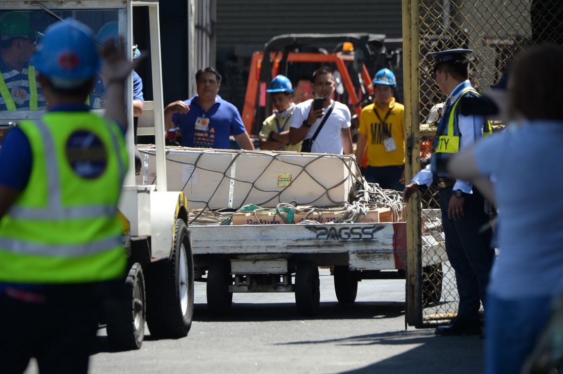 A casket containing Demafelis' body arrives last week in Manila.