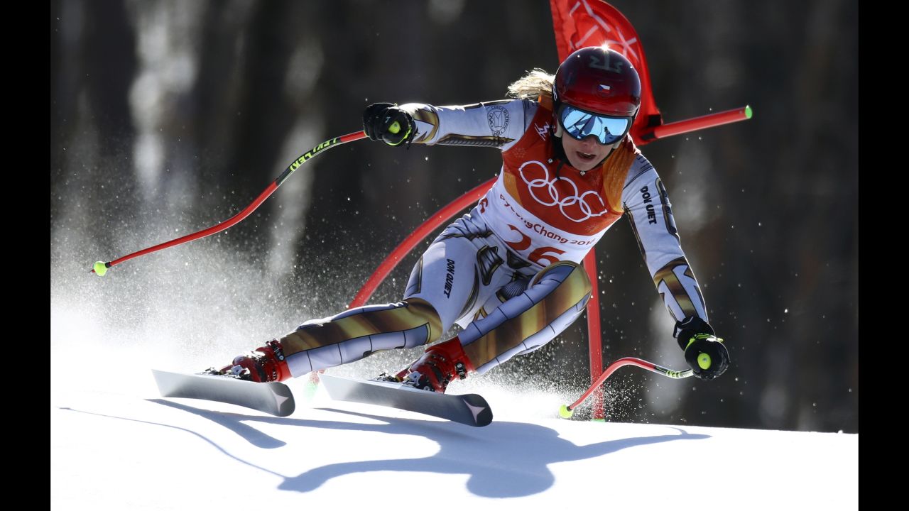 Ester Ledecka pulled off a shocking victory in the women's super-G. Ledecka, a 22-year-old from the Czech Republic, is more known for her <em>snowboarding</em> -- she was a world champion last year in the parallel giant slalom. But now she is an Olympic champion in skiing after winning the super-G by just 0.01 of a second. Next week, she will make history again as the first Olympic athlete to compete in both snowboarding and Alpine skiing.