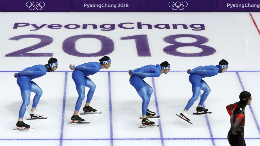 Italian speedskaters practice for the team pursuit race.