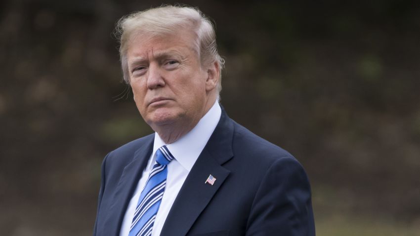 US President Donald Trump walks to Marine One prior to departure from the South Lawn of the White House in Washington, DC, February 16, 2018, as he travels to Florida for the weekend. / AFP PHOTO / SAUL LOEB        (Photo credit should read SAUL LOEB/AFP/Getty Images)