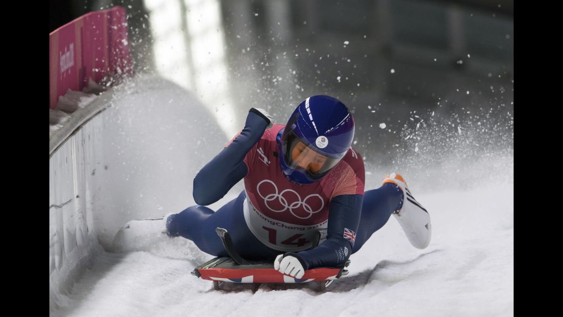Great Britain's Lizzy Yarnold celebrates at the finish line in the women's skeleton event. She won the gold medal.
