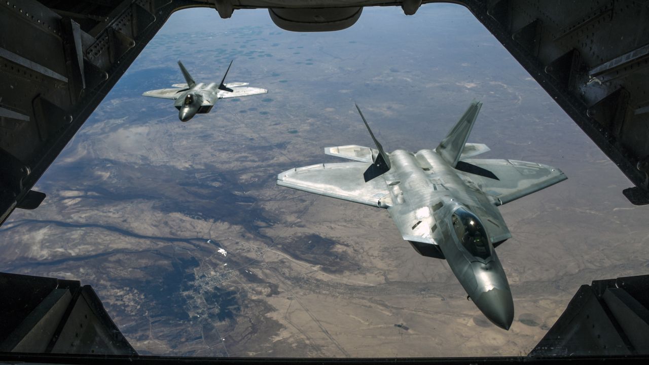 Two U.S. Air Force F-22 Raptors fly above Syria in support of Operation Inherent Resolve, Feb. 2, 2018. The F-22 is an air superiority fighter that incorporates the latest technological advances in reduced observables, avionics, engine performance and aerodynamic design. (U.S. Air National Guard photo by Staff Sgt. Colton Elliott)