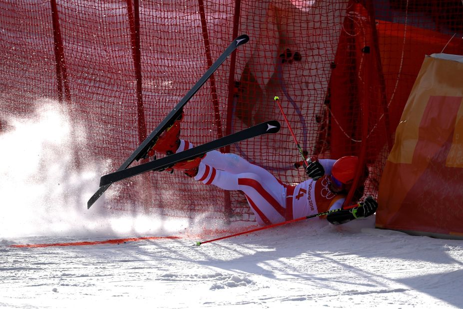 Manuel Feller of Austria crashes at the finish during the men's giant slalom in alpine skiing.