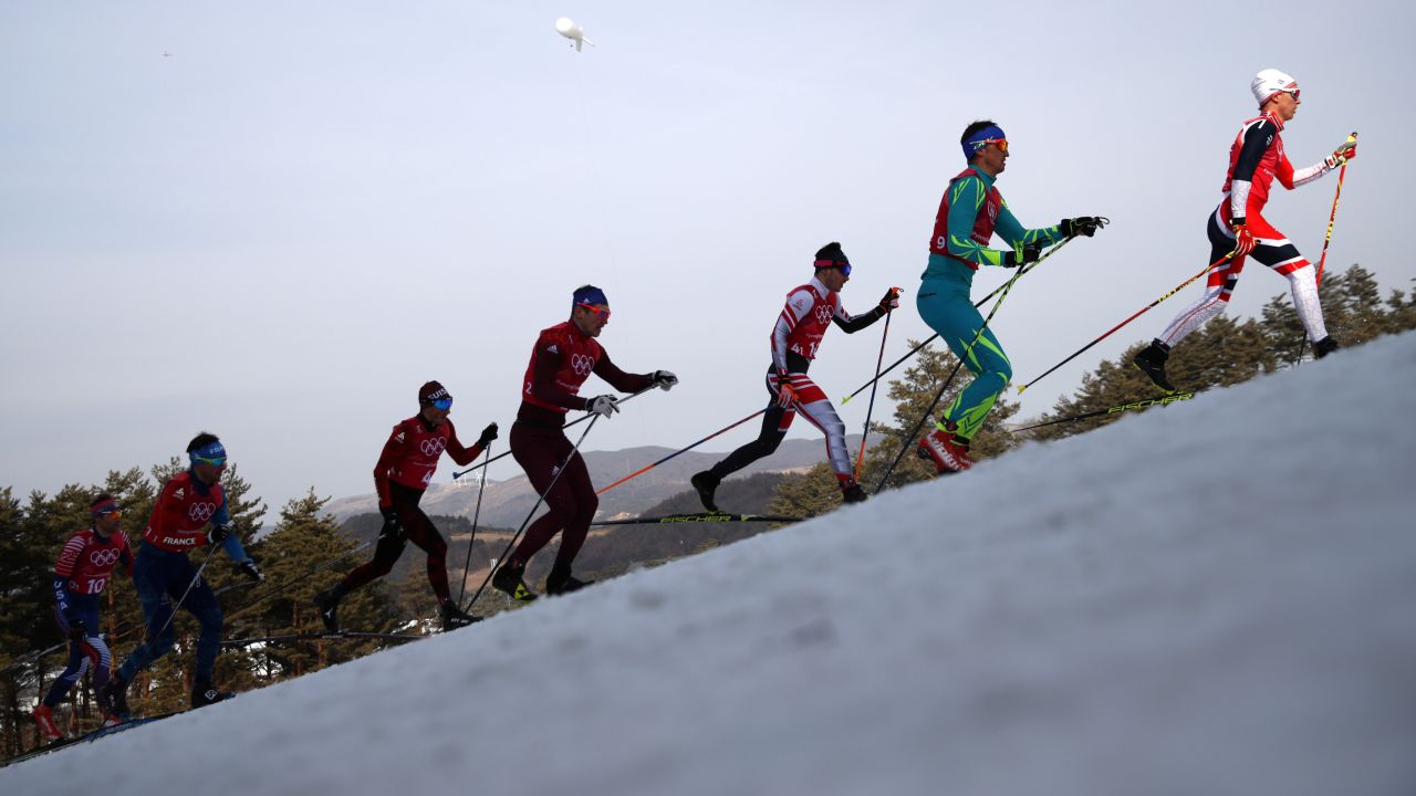 Didrik Toenseth of Norway leads in the first leg of the men's 4x10km relay in cross-country skiing.