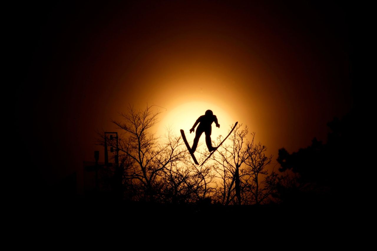 Lukas Runggaldier of Italy soars through the air during training for the nordic combined competition.