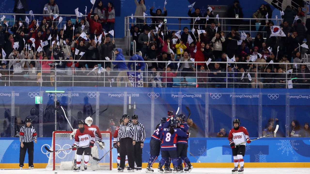 The unified Korean team celebrates Griffin's goal against Japan.