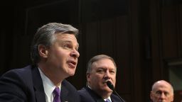 WASHINGTON, DC - FEBRUARY 13:  (L-R) Federal Bureau of Investigation Director Christopher Wray, Central Intelligence Agency Director Mike Pompeo and Director of National Intelligence Dan Coats testify before the Senate Intelligence Committee in the Hart Senate Office Building on Capitol Hill February 13, 2018 in Washington, DC. The intelligence chiefs were called to testify to the committee about 'world wide threats.'  (Photo by Chip Somodevilla/Getty Images)