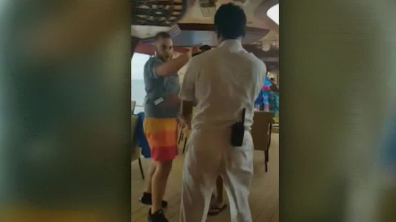Video shows the passengers brawling with each other and being confronted by crew members.