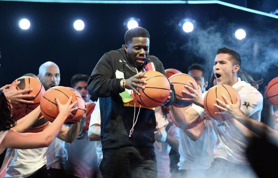 Actor Kevin Hart performs during the pregame ceremonies.