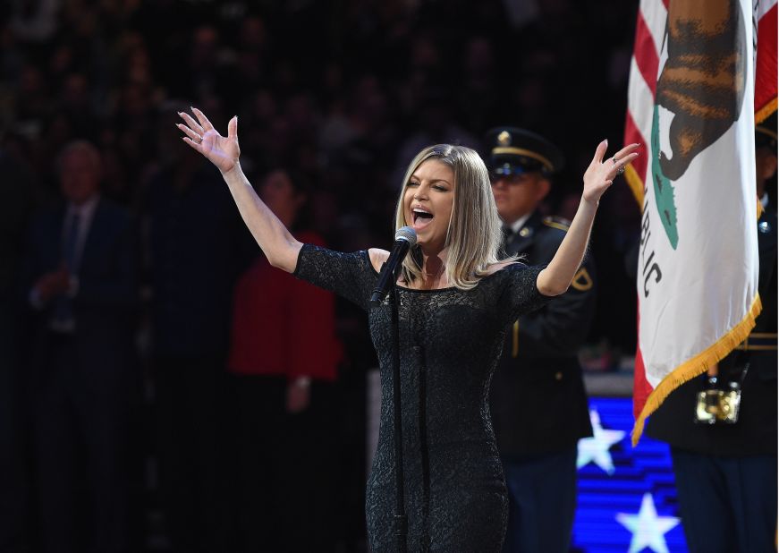 Fergie sings the National Anthem before the game.