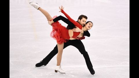 South Korea's Yura Min and Alexander Gamelin skate together in the ice dancing.