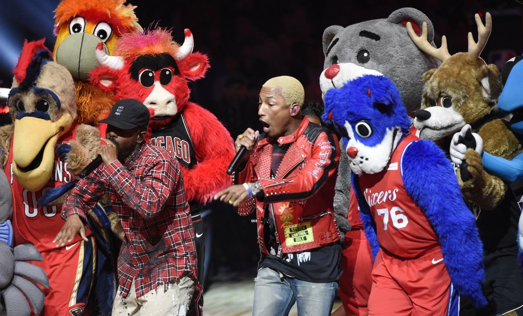 N.E.R.D performs with NBA mascots during the halftime show.