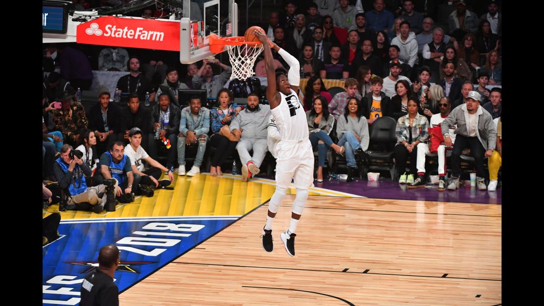Victor Oladipo throws down a reverse dunk on a breakaway.