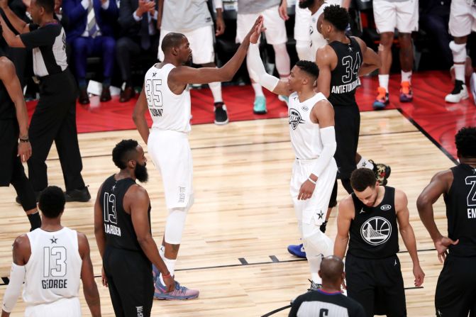 Former Oklahoma City teammates Kevin Durant and Russell Westbrook, seen here high-fiving, were reunited on Team LeBron.