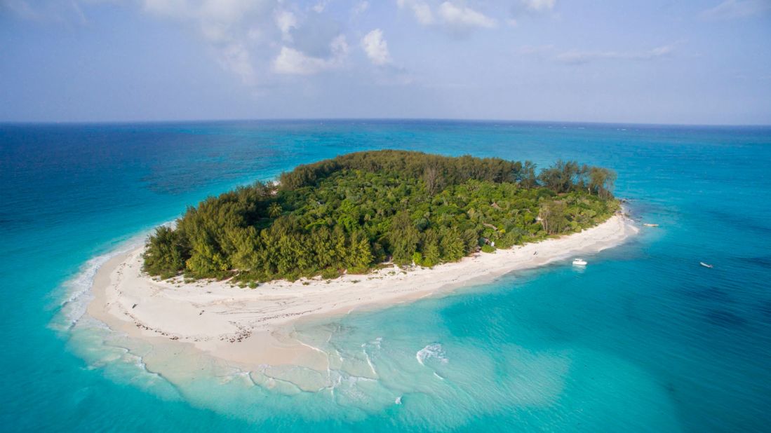 <strong>Mnemba Island: </strong>Dubbed the "Millionaire's Island," &Beyond Mnemba Island is wrapped by an oval reef  (often referred to as the Mnemba Atoll), which has been declared a marine conservation area. 