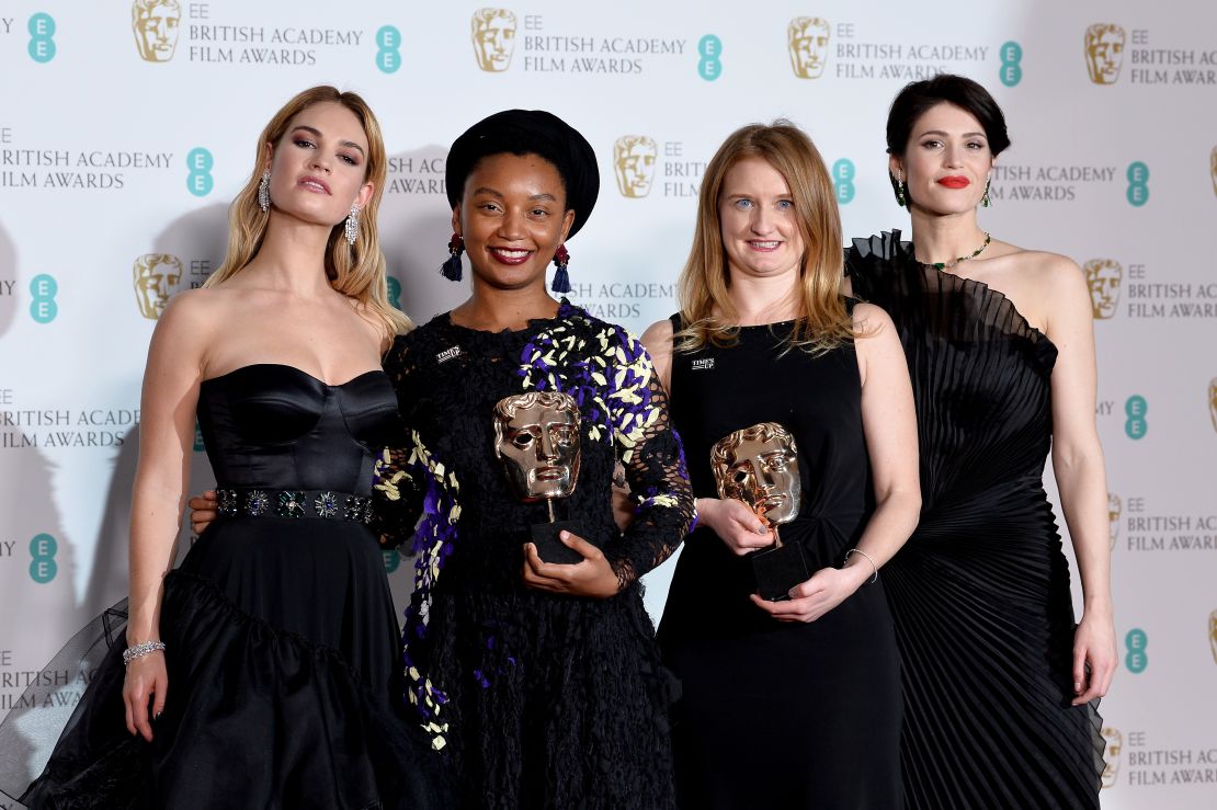 Presenters Lily James (L) and Gemma Arterton (R) and Rungano Nyoni (2ndL) and Emily Morgan (2ndR) at the 2018 BAFTAs.