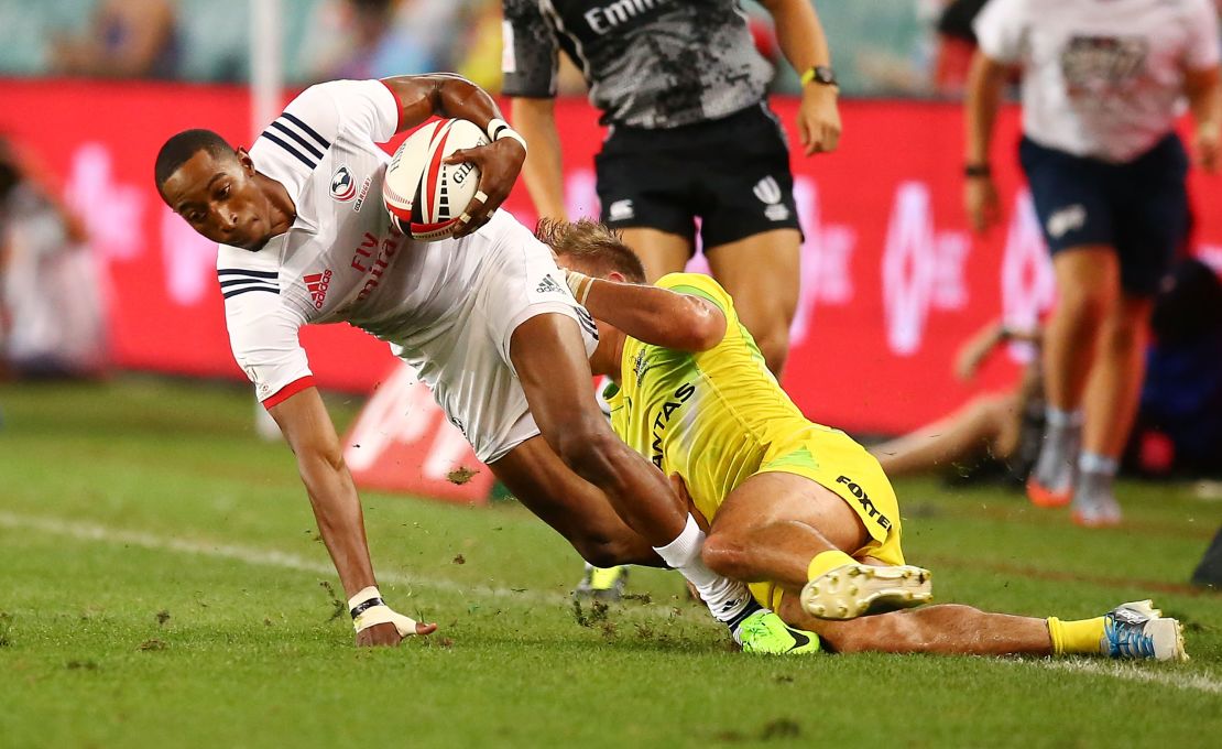 Baker tries to slip through a tackle during the 2018 Sydney Sevens clash between USA and Australia.