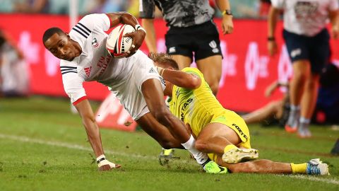 Baker tries to slip through a tackle during the 2018 Sydney Sevens clash between USA and Australia.