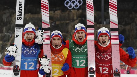Gold medallists Norway's Daniel Andre Tande, Andreas Stjernen, Johann Andre Forfang and Robert Johansson celebrate during the victory ceremony in the men's large hill team ski jumping final round.