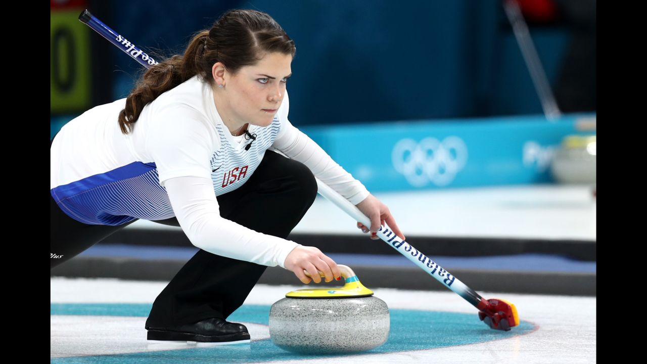 American Becca Hamilton delivers a stone during a round-robin curling match.