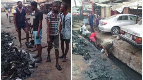 Chris Anaekwe and his team clean up the gutters in Onitsha.