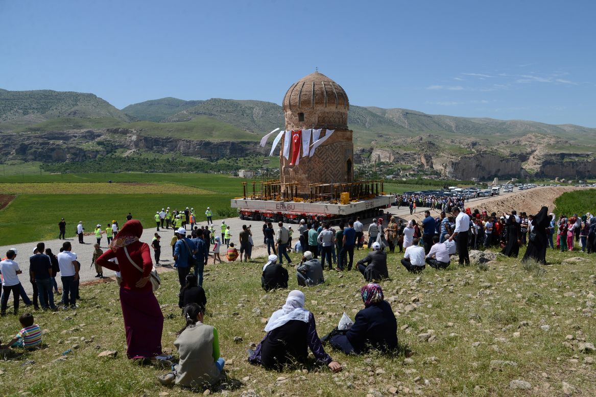 Locals watch the tomb of Zenyel Bey transported in May 2017. The 15th century monument, dedicated to a figure from the Ak Koyunlu, a Turkmen tribe, was moved away from ground at risk of flooding due to a hydroelectric dam project in southeast Turkey. The Ak Koyunlu, which translates as "White Sheep," once ruled Anatolia, Azerbaijan and northern Iraq in the 14th to early-16th century AD.