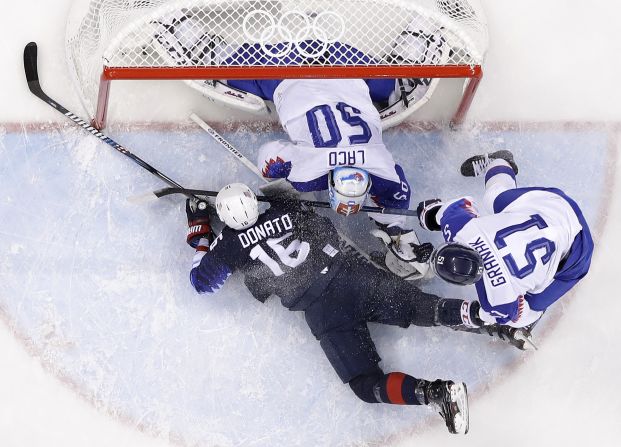 US forward Ryan Donato falls into the crease during the game against Slovakia. Donato had two goals as the Americans won 5-1 and advanced to the quarterfinals.