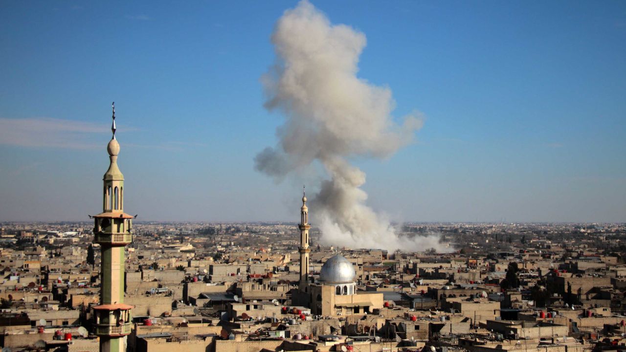 Smoke rises from buildings in Mesraba, Eastern Ghouta, after a bombardment on Monday.