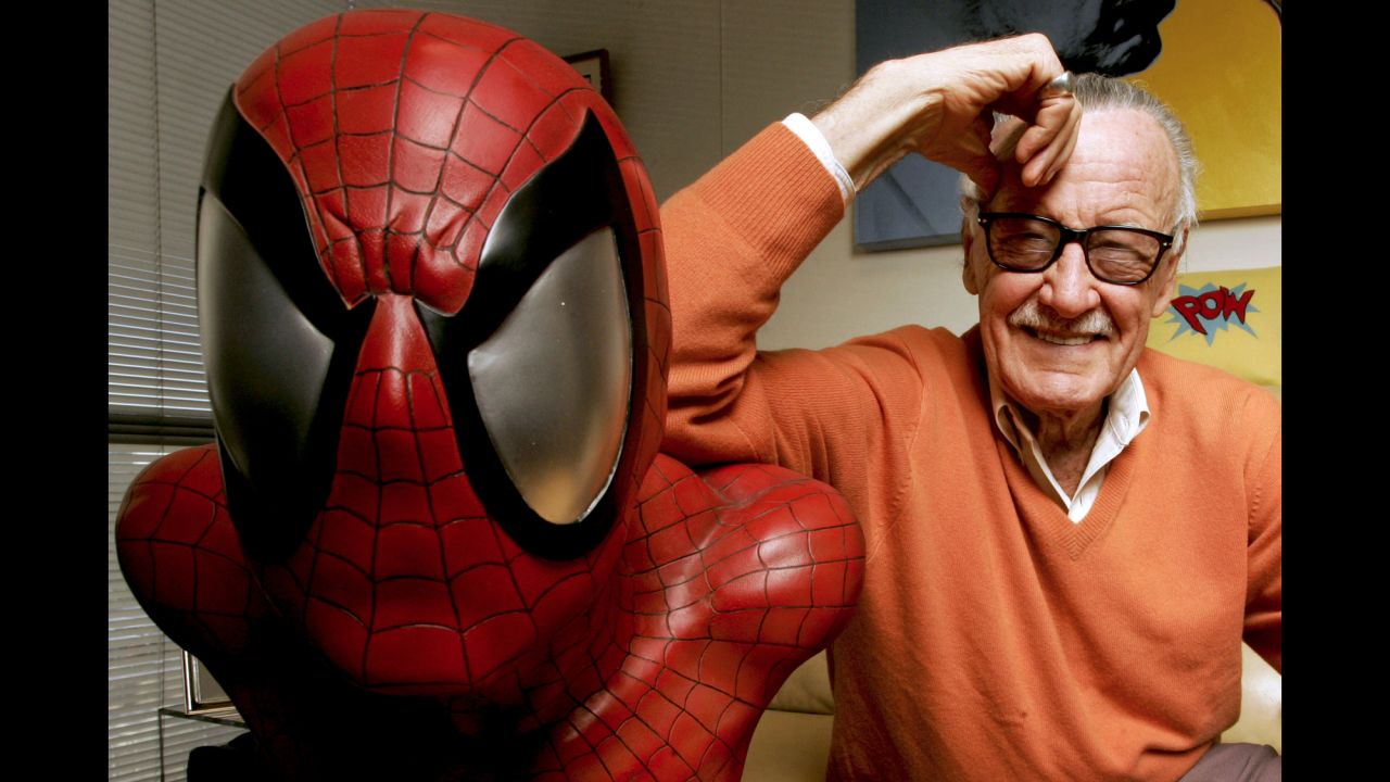 Stan Lee poses next to a Spider-Man model at his office in 2008. Lee, who co-created Spider-Man and many other popular comic book characters that have become household names, died Monday, November 12, at the age of 95.