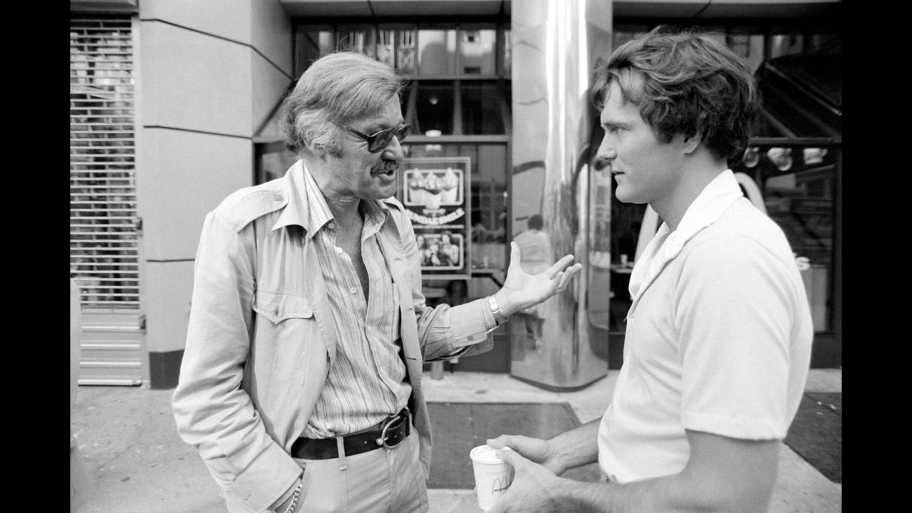 Lee talks to actor Nicholas Hammond during the filming of the television series "The Amazing Spider-Man" in 1978.