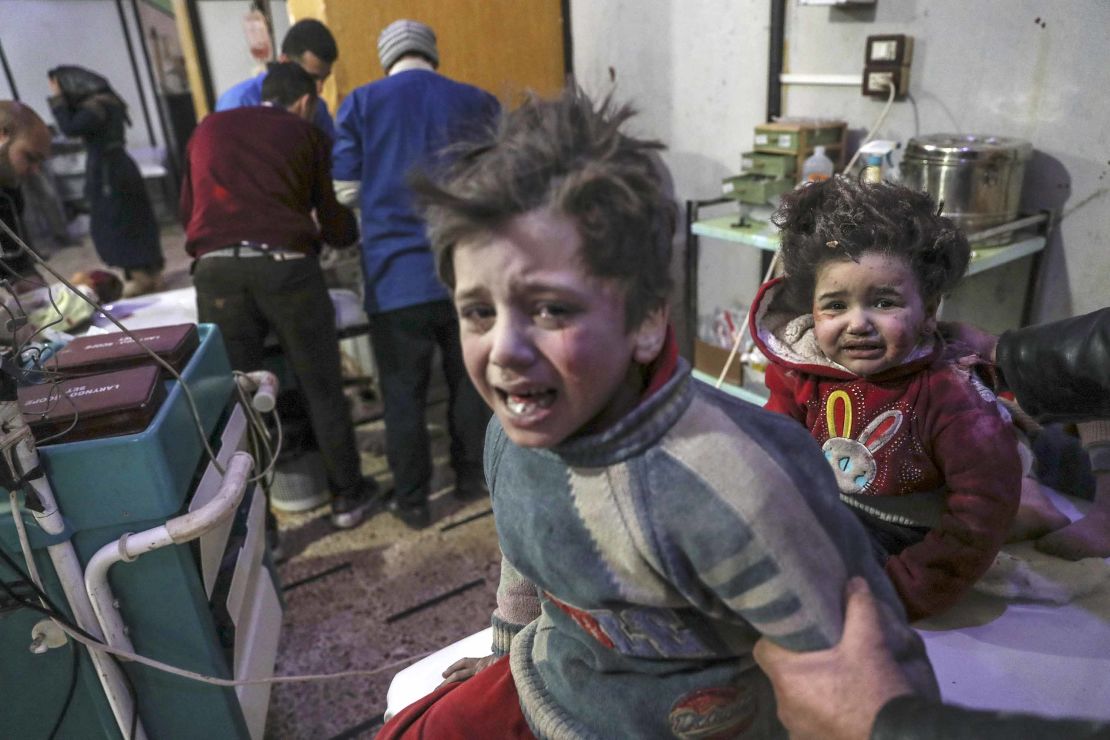 Injured children are treated at a hospital in rebel-held Douma, Eastern Ghouta, on Monday.