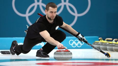 Aleksandr Krushelnitckii of Olympic Athletes from Russia delivers a stone against Norway during the Curling Mixed Doubles Bronze Medal Game.